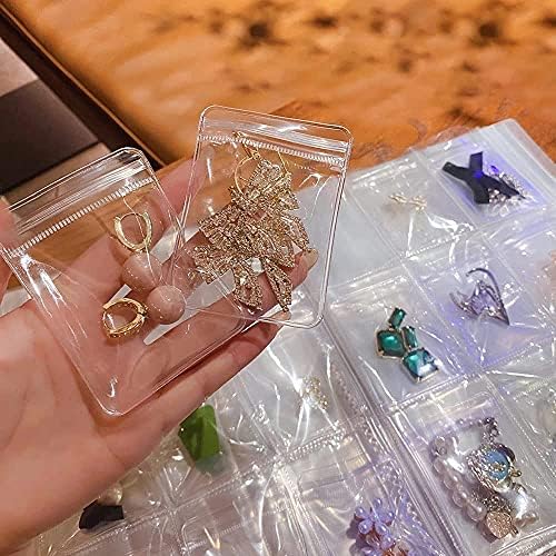תכשיטים של Xinbada מארגן נסיעות- ספר אחסון תכשיטים שקוף מארגן ספרי עגיל תכשיטים ניידים עם 50